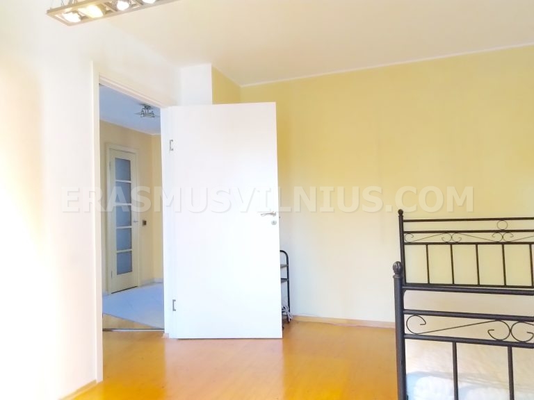 Bright room with window view in Vilnius old town flat