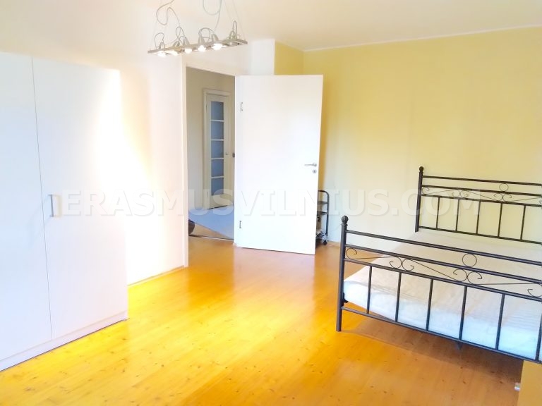 Room detail showing bedside table and lamp in student accommodation