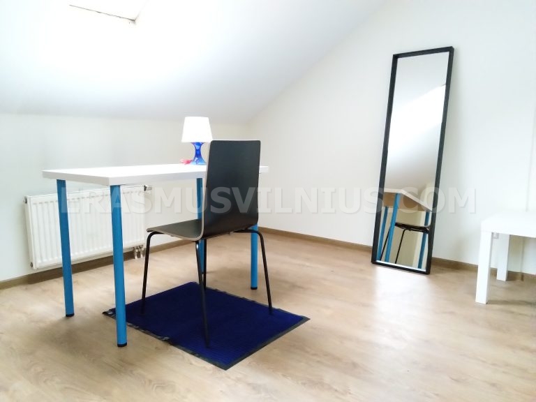 Private bedroom with desk, chair and wardrobe for Erasmus students in Vilnius