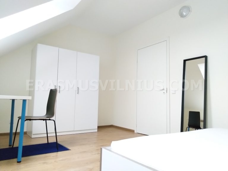 Fully equipped shared kitchen with two fridges and oven