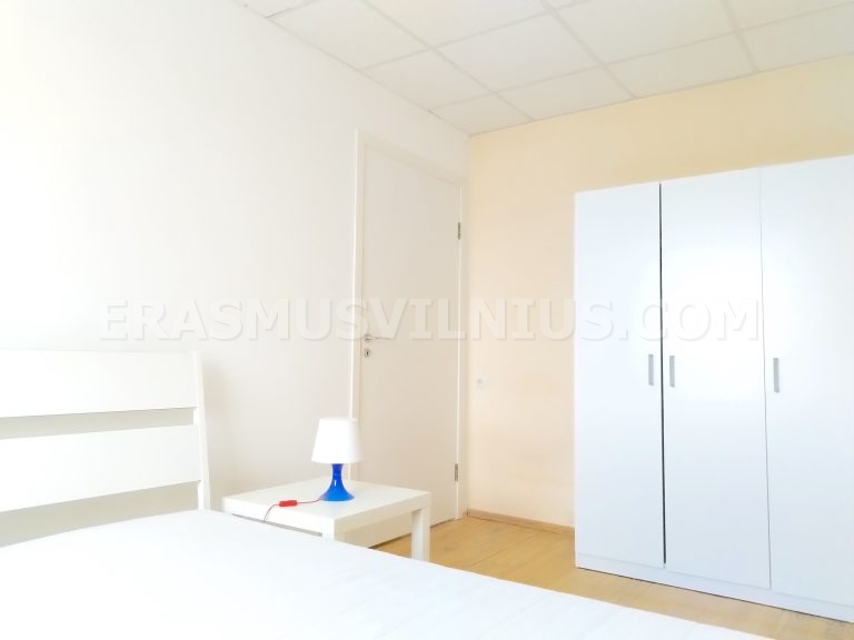 Bright room with natural light and king size bed in Erasmus student flat, Vilnius